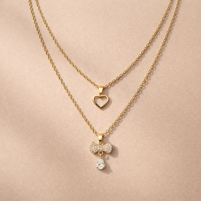 Layered Gold Heart & Bow Charm Necklace