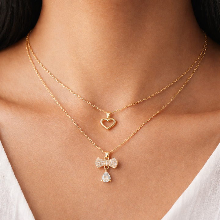 Layered Gold Heart & Bow Charm Necklace