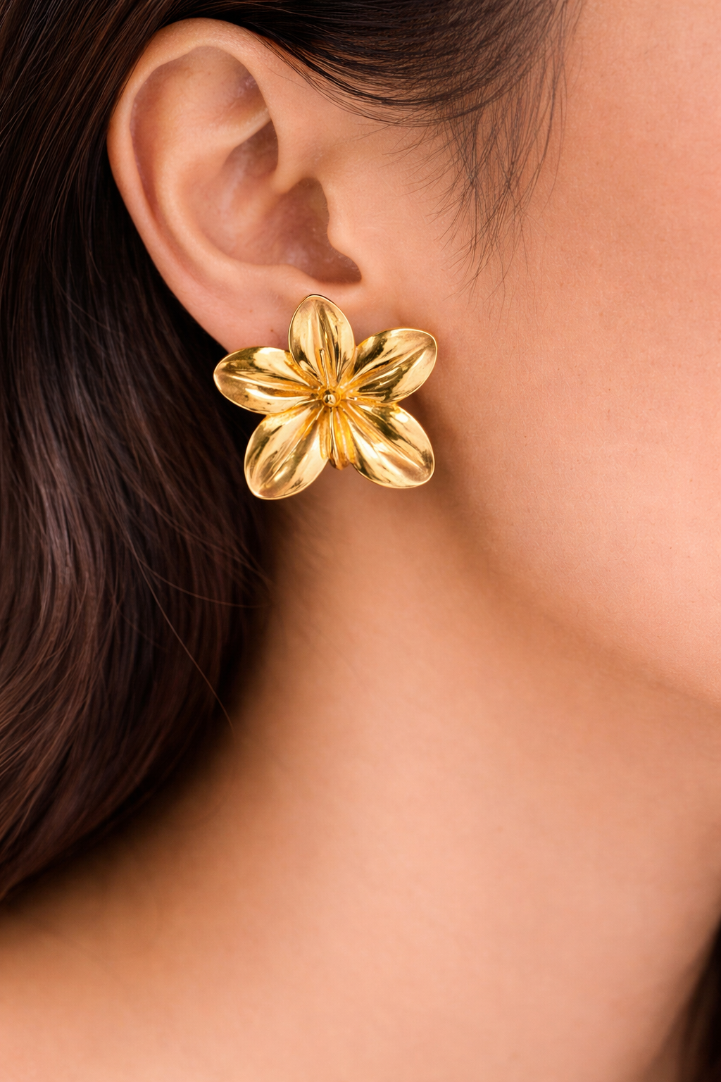 Gold floral stud earrings
